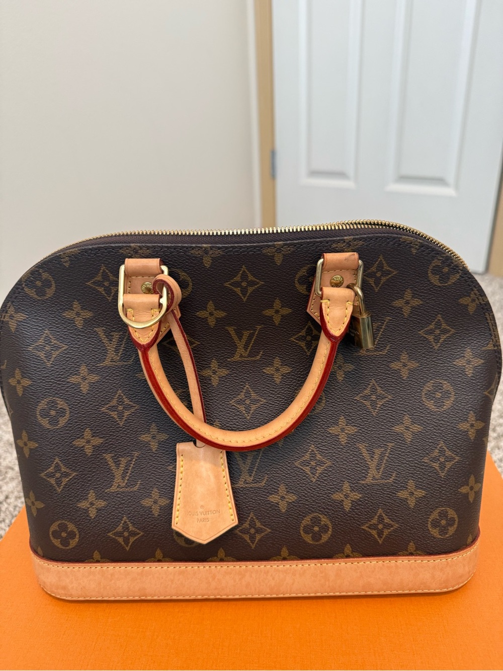 Louis Vuitton Monogram Alma Handbag in Brown and Tan